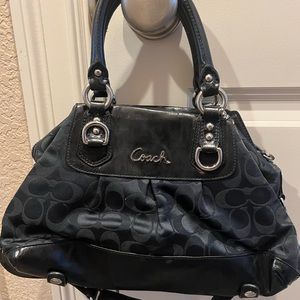 Black Woman’s Coach Bag